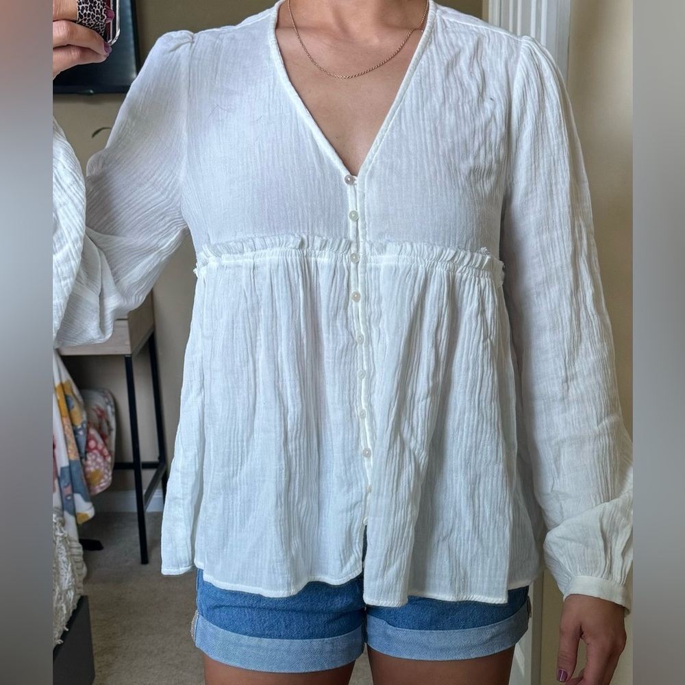 White button down peplum blouse with puffy long sleeves